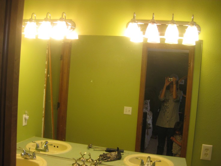 Asparagus green paint shown in the wall-sized mirror.